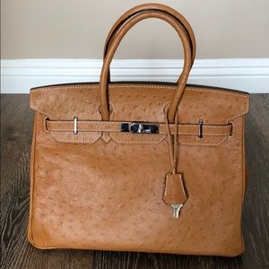 Tan ostrich print leather double handed satchel